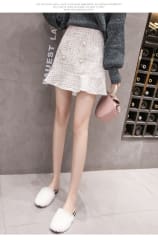 Falda Conti de cuadros con Botón Blanca