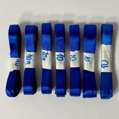 Cintas satín de 15 y 20 mm en tonos azules, 70 metros total - Producto de vitrina