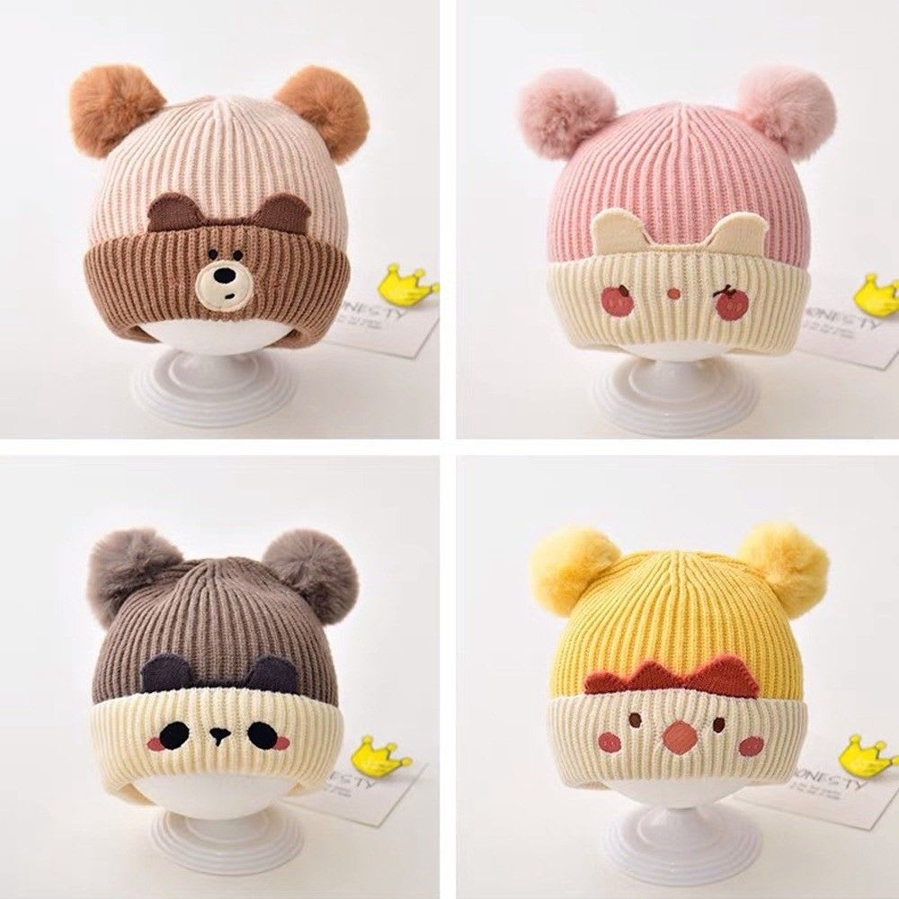 GORRO TEJIDO 2 POMPONES1