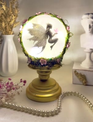 Esfera grande en pilar dorado1