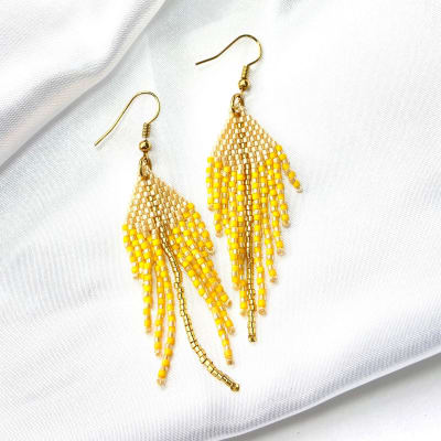 Aros Pluma amarillo ACJ1