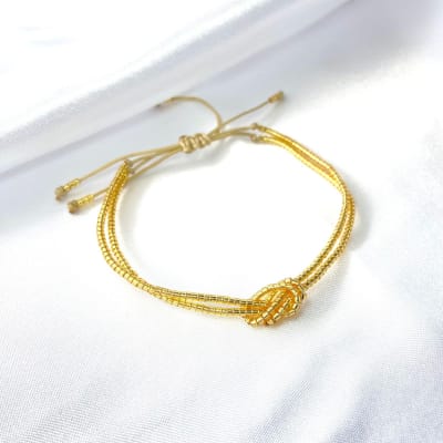 Pulsera Nudo dorado1
