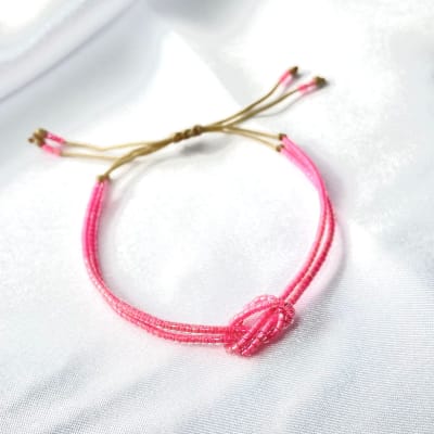 Pulsera Nudo rosado flúor1