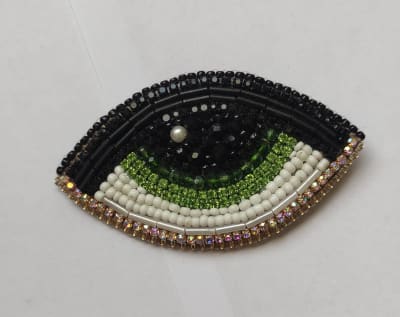 Prendedor ojo verde1