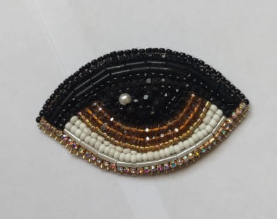 Prendedor ojo café1