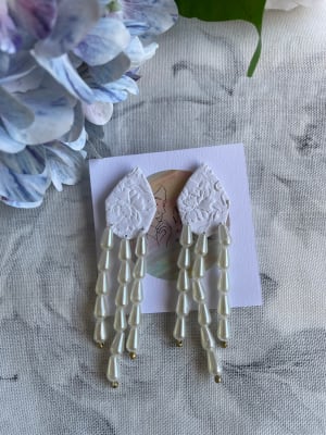 Papel mural con fleco de perlas1