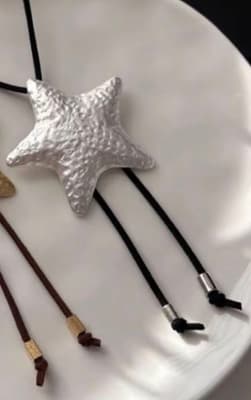 Collar estrella plata corbatin1