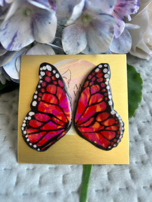 Aros mariposa fucsia naranja dany1