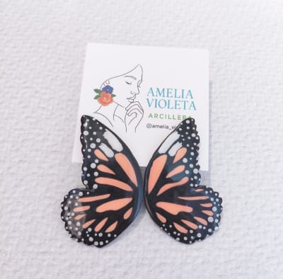 Aros Mariposa pintada negra naranja1