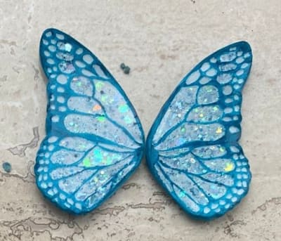Aros Mariposa Arcilla Polimérica Resinada celeste1