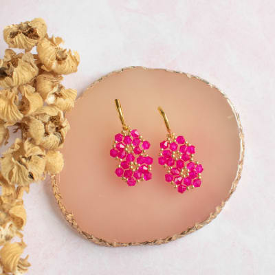 Aros Aura fucsia y dorado1