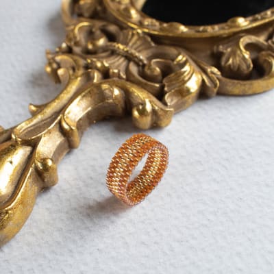 Anillo Cintas café y dorado1