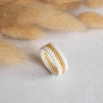 Anillo Cintas blanco y dorado1