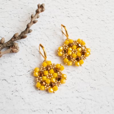 Aros Hexágono amarillo y bronce1