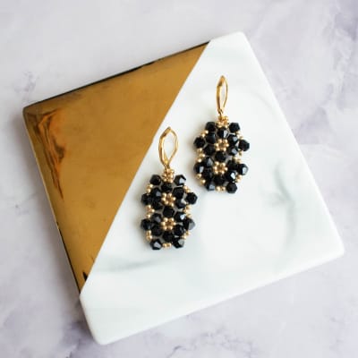 Aros Aura negro y dorado1