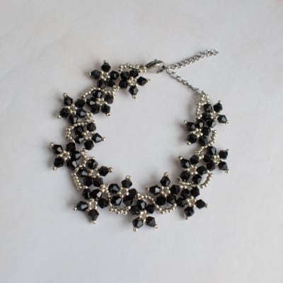 Pulsera Flores negro1