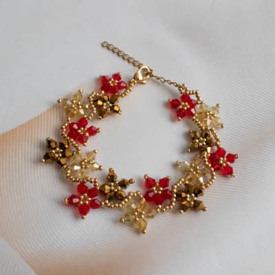 Pulsera Flores rojo, dorado y beige1