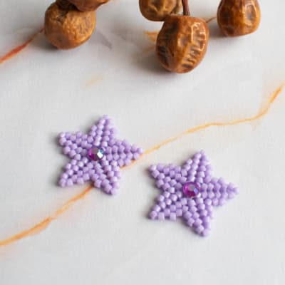 Aros Estrellitas con gema lila1