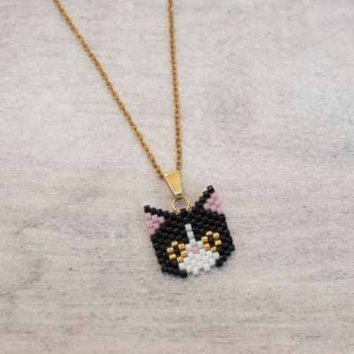 Collar Gato negro, blanco y dorado1