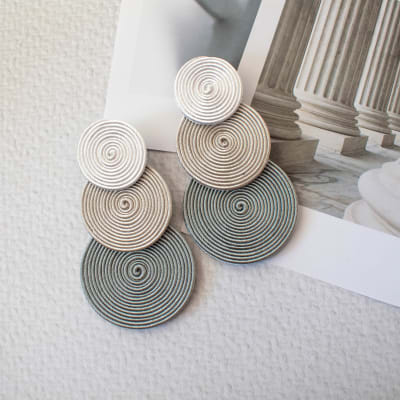 Aros Tres círculos blanco, gris y plomo1