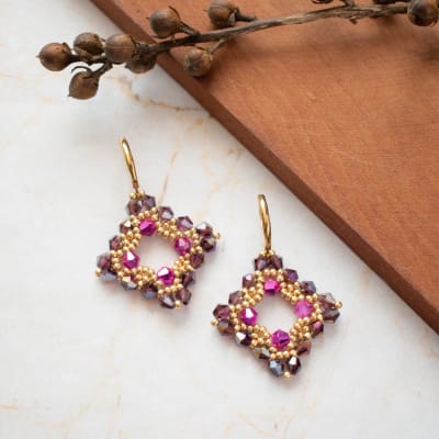 Aros Taylor morado y fucsia1