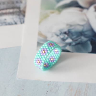 Anillo Florcitas turquesa y lila1