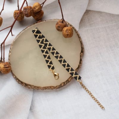 Pulsera ZigZag Simple negro y dorado1