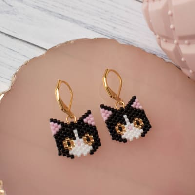 Aros Gato negro, blanco y dorado1