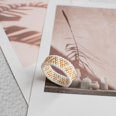 Anillo Inti blanco y dorado1