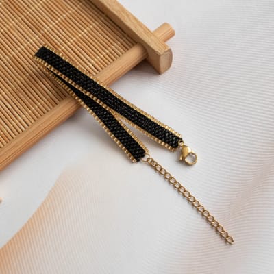 Pulsera Jane negro y dorado1