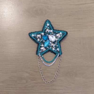 Prendedor estrella cadena turquesa1