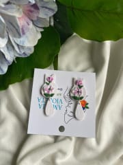 Aros Gatitos blancos con flores lila