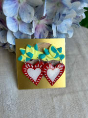 Corazón estrambótico con media flor