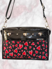 Bandolera Corazones y tachas