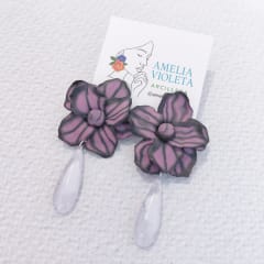 Aros Flor lila negra con gota resina blanca