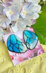 Aros Mariposa fondo marmoleado azul, celeste y dorado