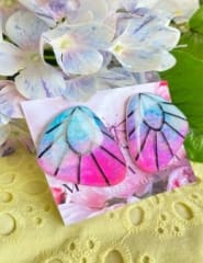 Aros Mariposa L fondo marmolado fucsia y azul