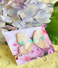 Aros Mariposa Línea botánica en colores beige, rosa, verde y dorado