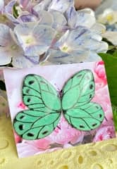 Aros Mariposa color verde metalizado