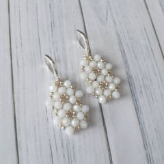 Aros Aura blanco y plateado