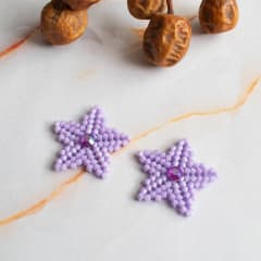 Aros Estrellitas con gema lila