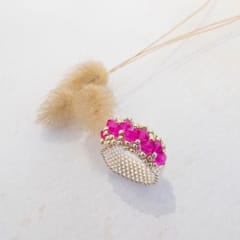 Anillo Corona transparente y fucsia