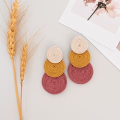 Aros Tres Círculos crema, dorado y palo rosa