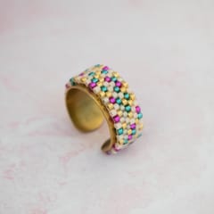 Anillo ajustable mix magenta, esmeralda y dorado
