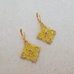 Aros Flor de Loto amarillo traslúcido