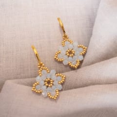 Aros Flor de Loto blanco traslúcido