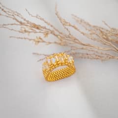 Anillo Corona dorado y transparente