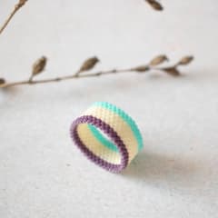 Anillo Tres cintas morado, beige y turquesa