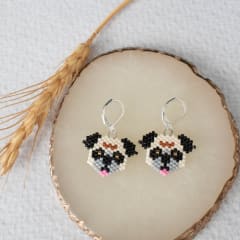 Aros Pug crema