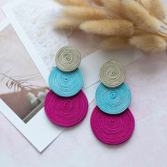 Aros Tres círculos magenta, celeste y gris